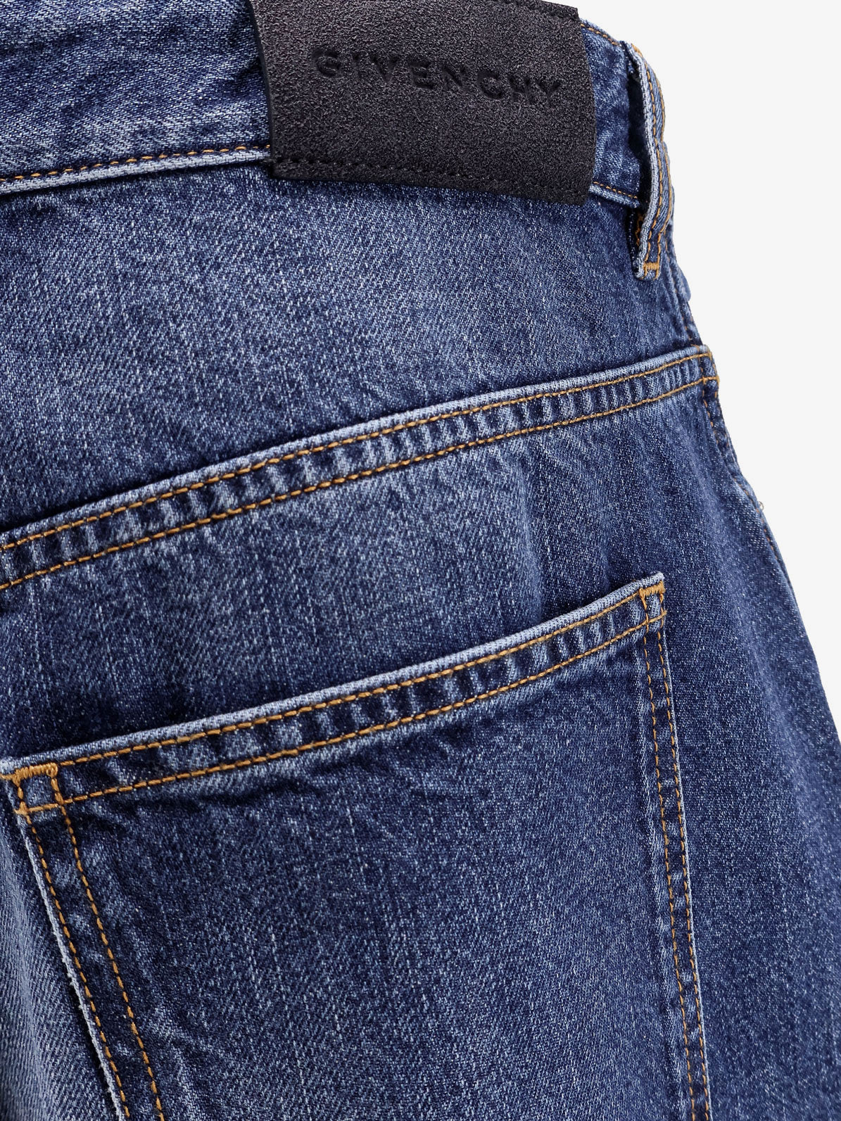 Givenchy Twisted Stone Washed Denim Jeans