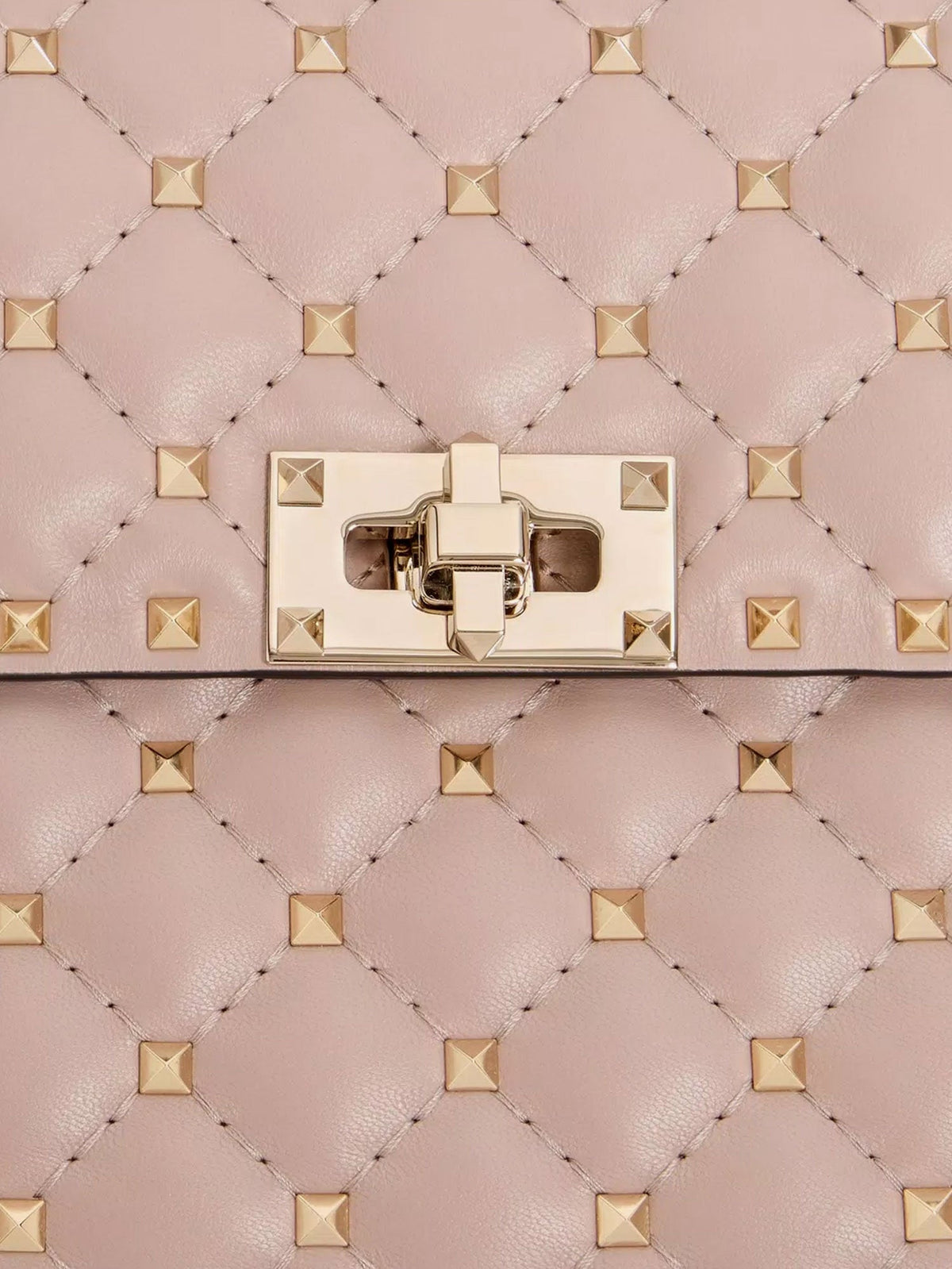 Valentino Garavani Rockstud Spike leather crossbody bag with iconic all-over studs - Poudre