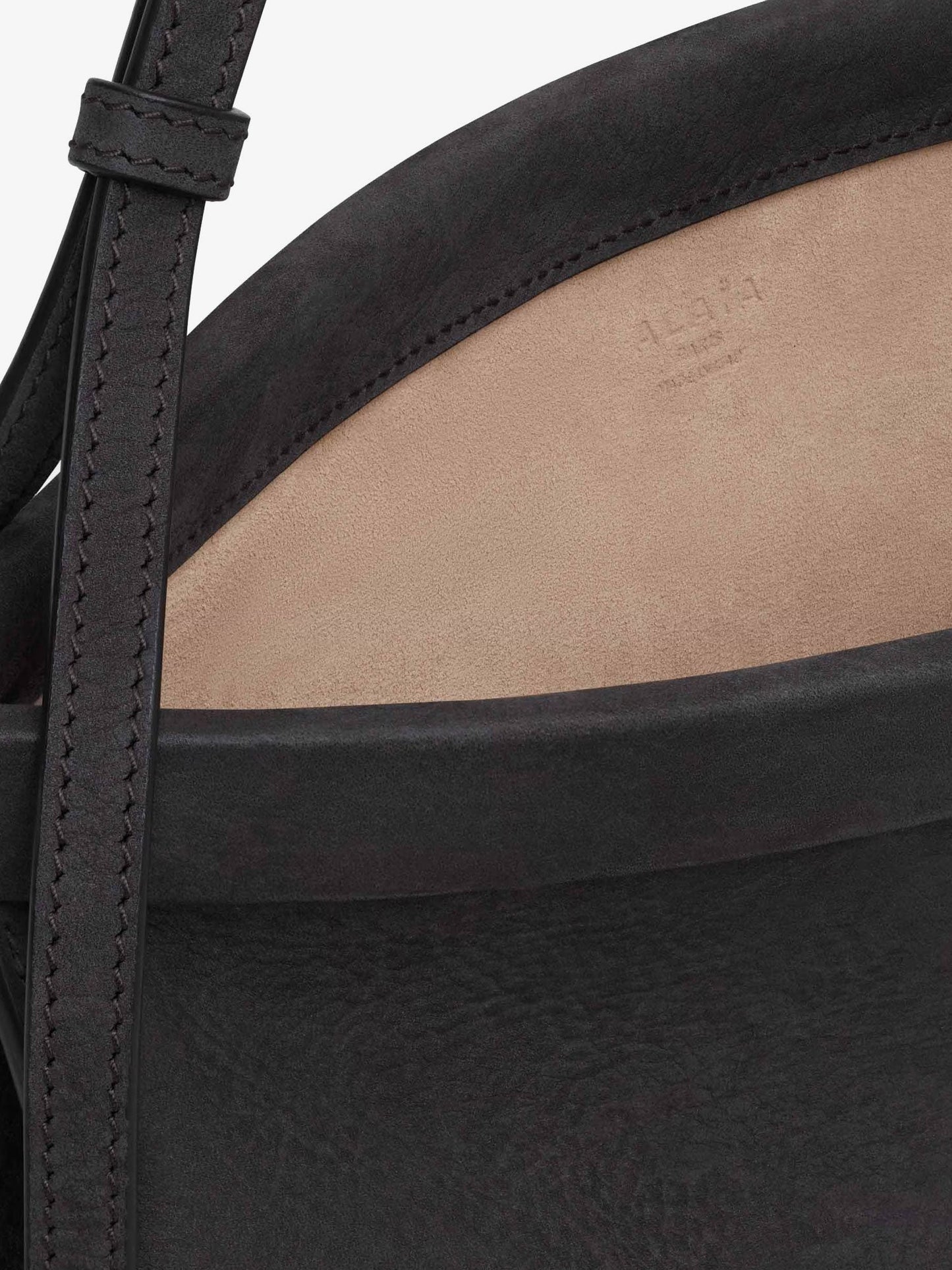 Alaia East West Leather Shoulder Bag With Engraved Logo Lettering