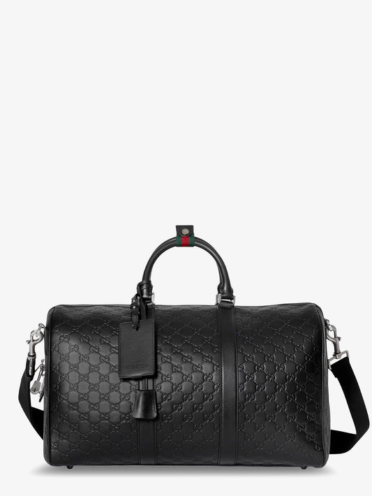 Gucci Coated Canvas Gg Emblem Travel Bag With Gg Motif
