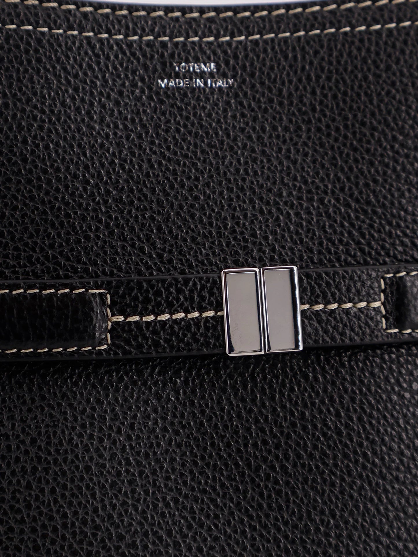 Toteme Hammered Leather Bucket Bag With Strap On The Front