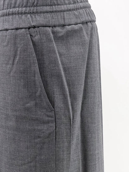 AMI PARIS - Virgin wool trousers with elastic