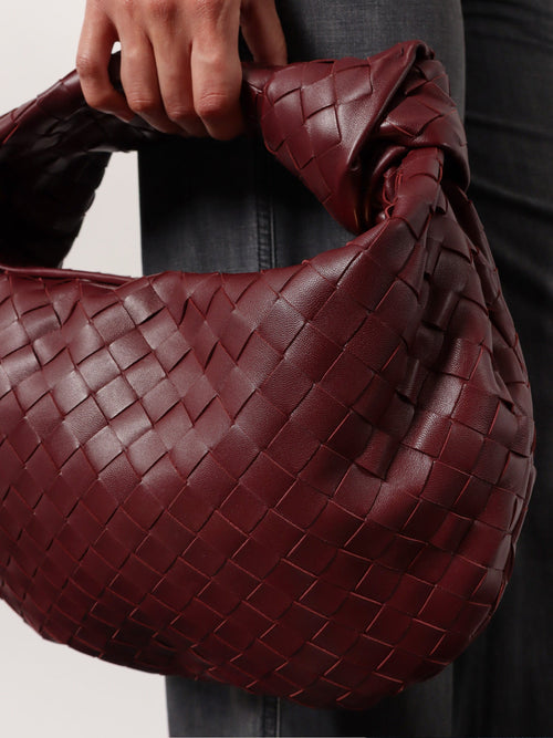Bottega Veneta Jodie Small leather handbag with Intrecciato motif - Barolo-Gold