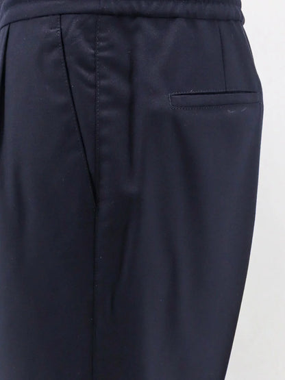 BRUNELLO CUCINELLI - Virgin wool trousers with adjustable drawstring