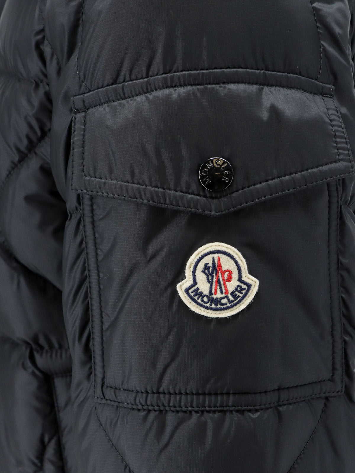 Moncler Asurel short down jacket with geometric stitching - Nero