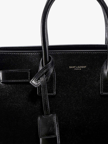 Saint Laurent Baby Sac de Jour leather handbag with padlock - Nero/Nero