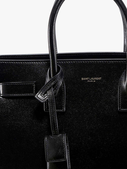 Saint Laurent Baby Sac de Jour leather handbag with padlock - Nero/Nero