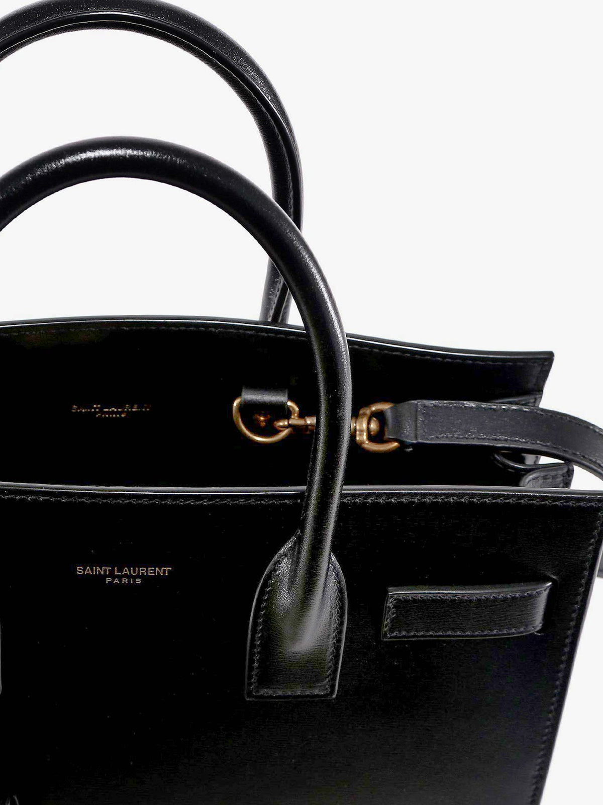 Saint Laurent Baby Sac de Jour leather handbag with padlock - Nero/Nero
