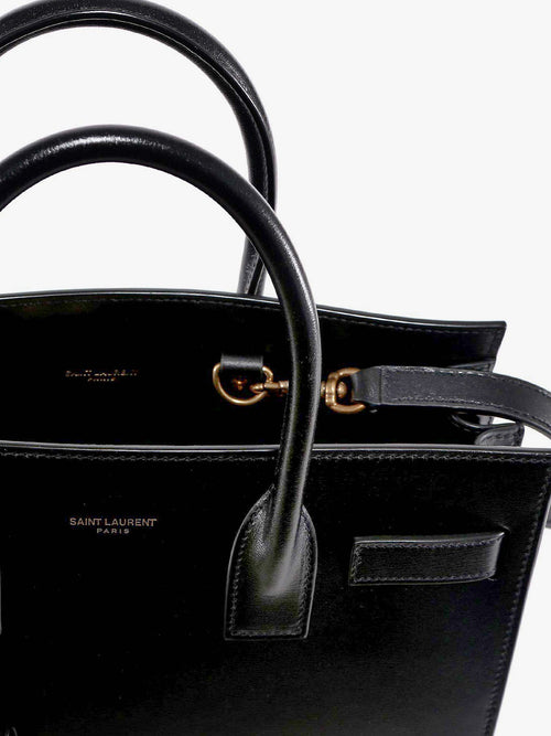 Saint Laurent Baby Sac de Jour leather handbag with padlock - Nero/Nero