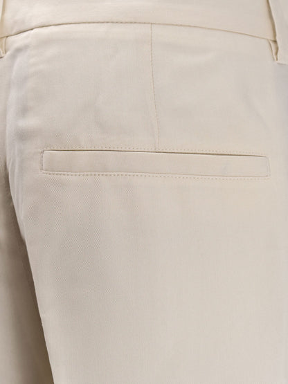 Toteme Double-pleat fluid viscose trousers - Ecru