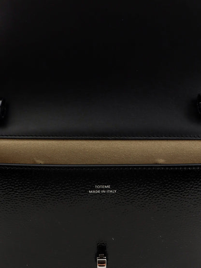 Toteme Patent T-Lock crossbody bag - Black