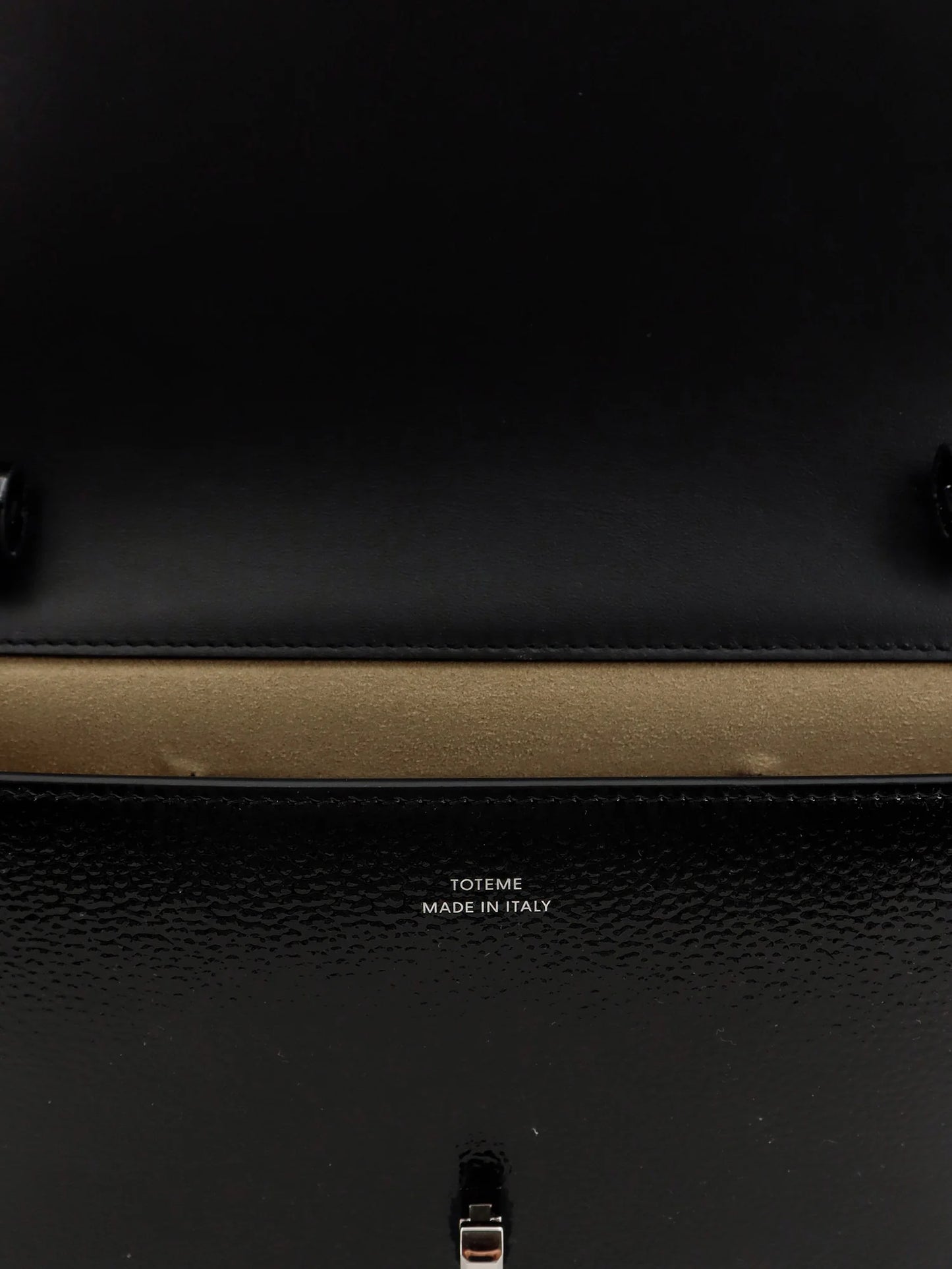 TOTEME - Patent T-Lock crossbody bag