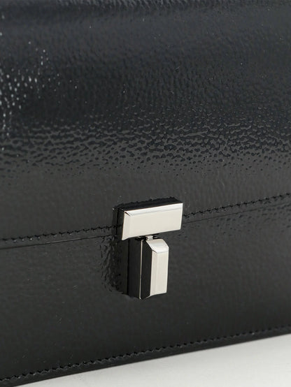 TOTEME - Patent T-Lock crossbody bag