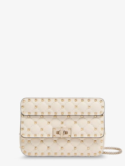 Valentino Garavani Rockstud Spike leather shoulder bag with iconic all-over studs - Lightivory