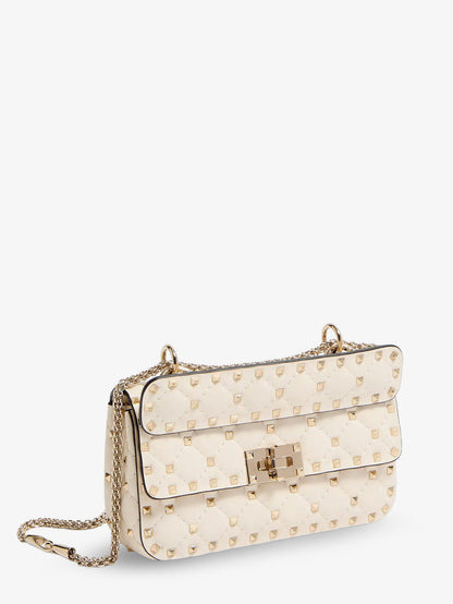 Valentino Garavani Rockstud Spike leather shoulder bag with iconic all-over studs - Lightivory