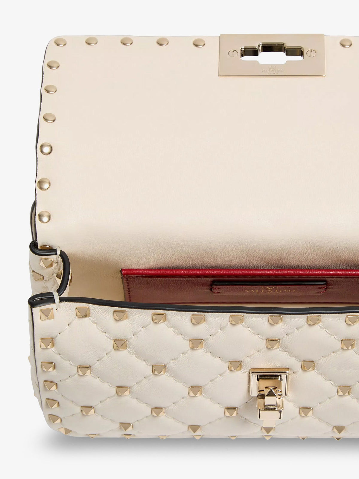 Valentino Garavani Rockstud Spike leather shoulder bag with iconic all-over studs - Lightivory
