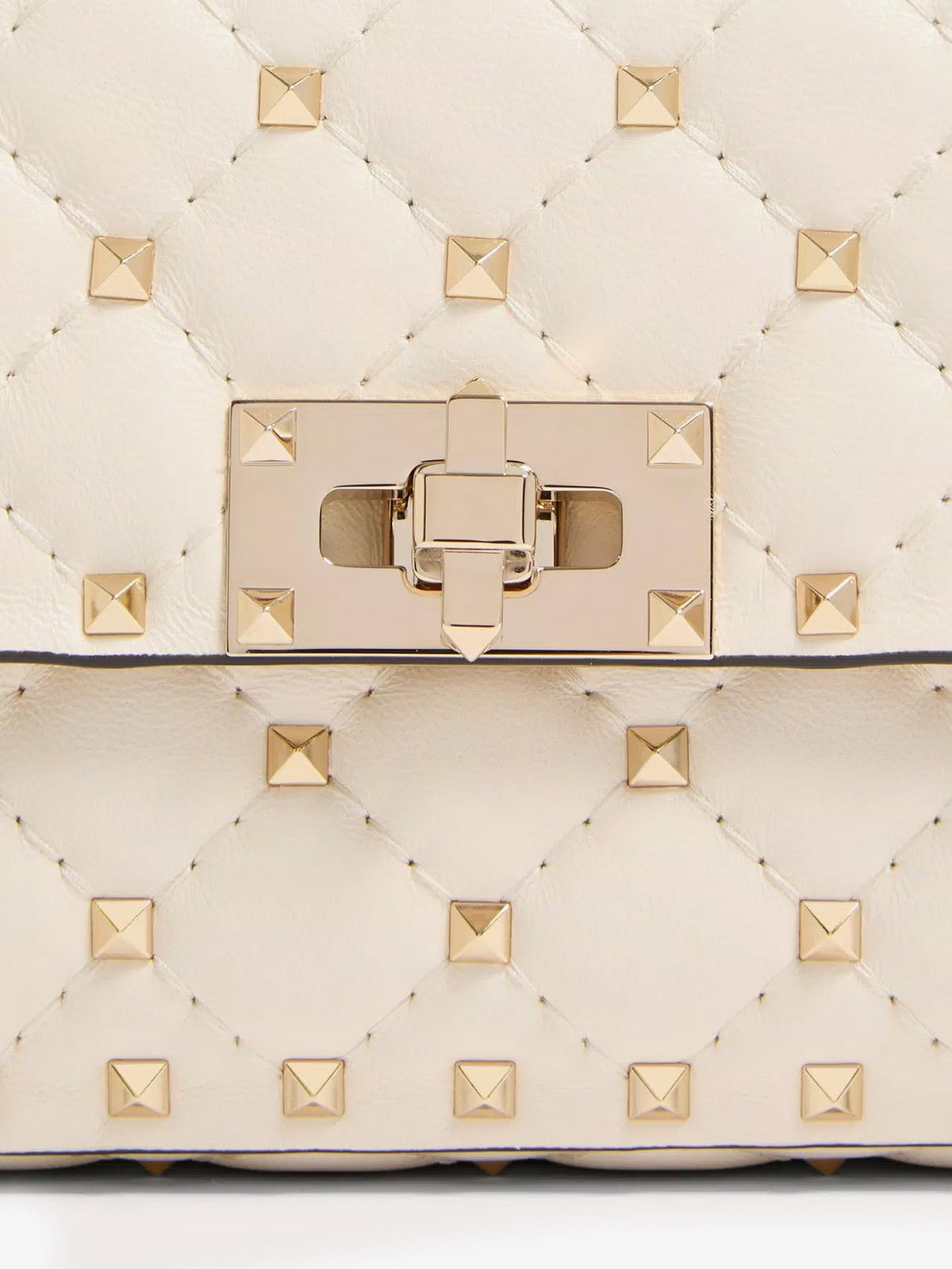 Valentino Garavani Rockstud Spike leather shoulder bag with iconic all-over studs - Lightivory