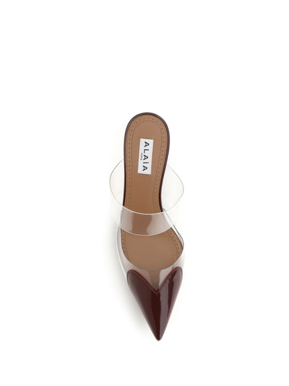 AlaïA Le Coeur patent leather Mules - Rouge Grenat