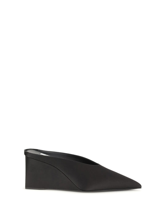 ALAÏA Satin wedge Mules