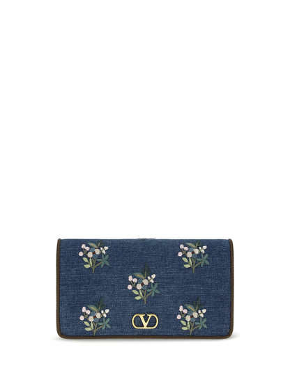 VALENTINO GARAVANI Mini VLogo Signature Shoulder Bag in denim with floral embroidery