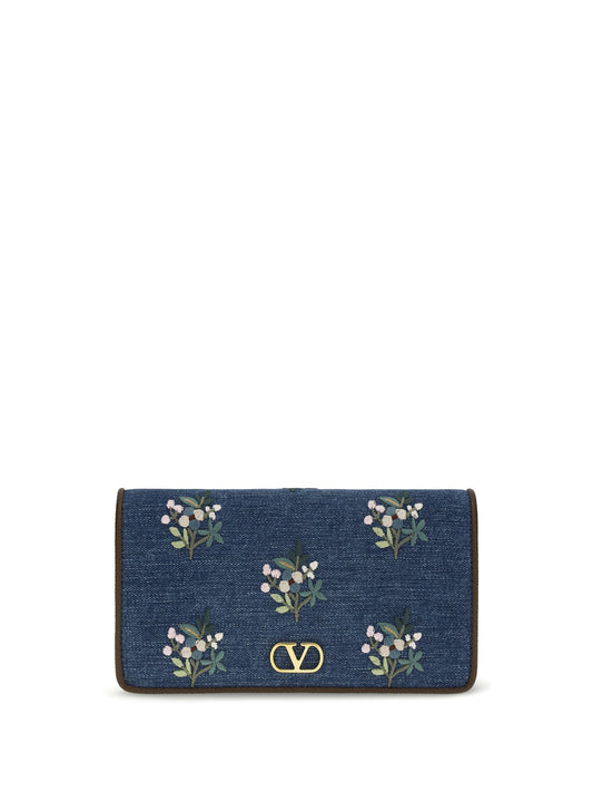 VALENTINO GARAVANI Mini VLogo Signature Shoulder Bag in denim with floral embroidery