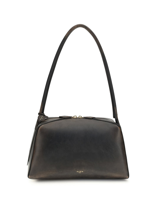 ALAÏA Le Bouledogue Shoulder Bag in aged leather