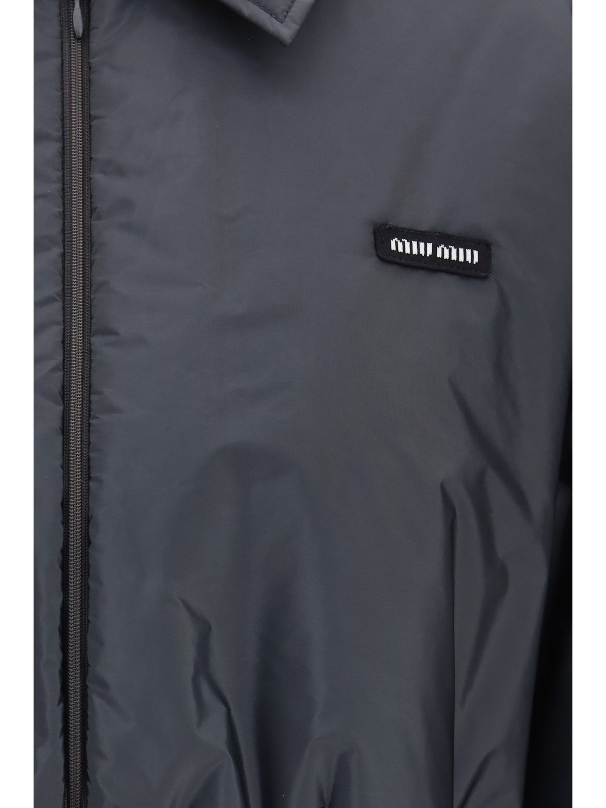 Miu Miu Technical fabric and shearling windbreaker Jacket - Ematite