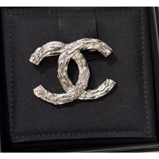 Chanel - CC Brooch in Shiny Silver