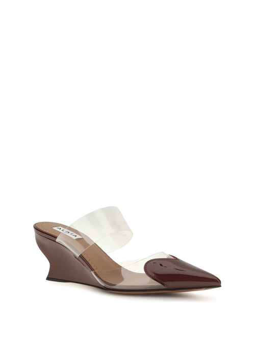 AlaïA Le Coeur patent leather Mules - Rouge Grenat