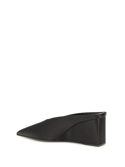 ALAÏA Satin wedge Mules