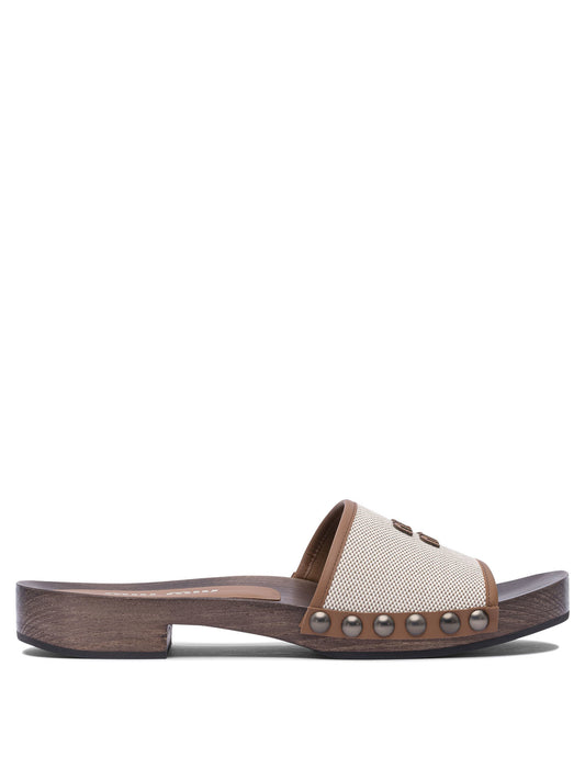 Miu Miu Canvas and leather clogs 30 mm - Beige