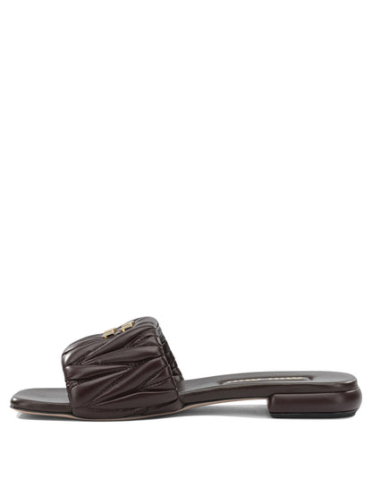 Miu Miu Matelassé leather slides - Brown
