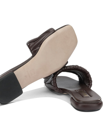 Miu Miu Matelassé leather slides - Brown