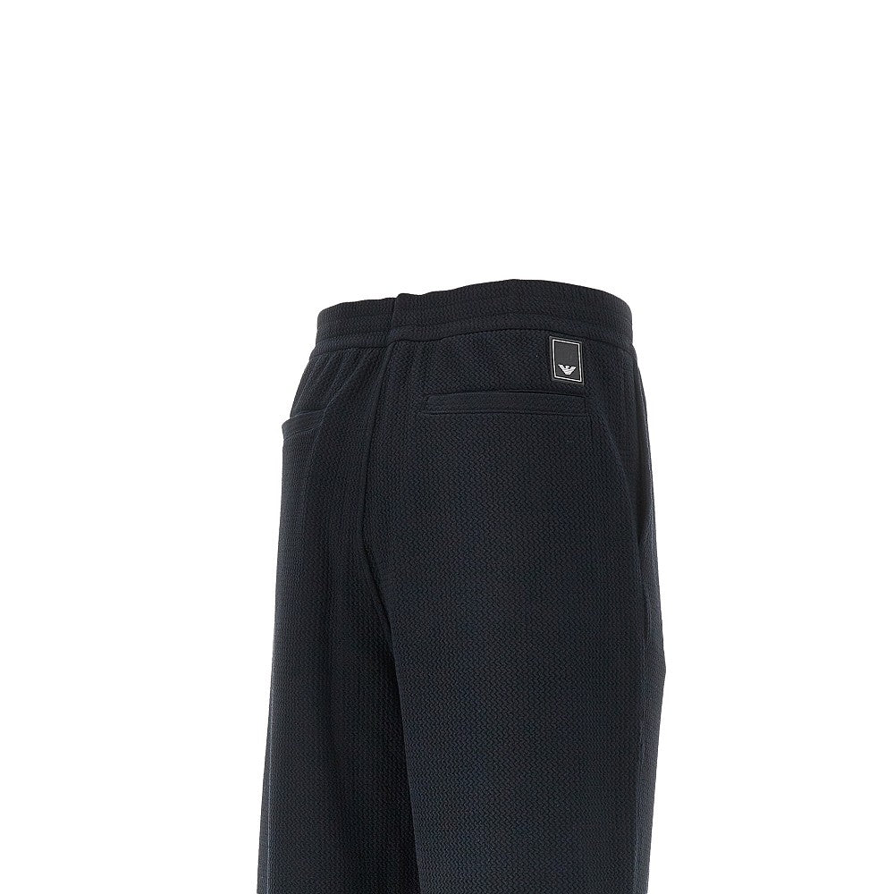 EMPORIO ARMANI Travel Essential embossed jersey pants