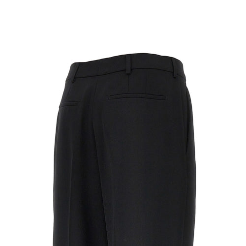 SAINT LAURENT Wool grain de poudre pants