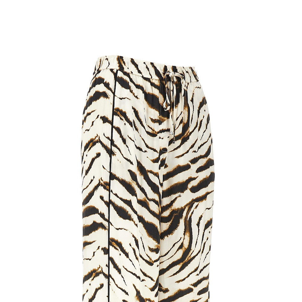 Ganni Satin pants with zebra-striped print