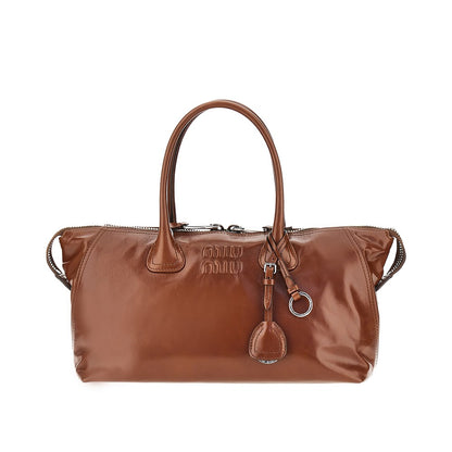 MIU MIU Glossy leather bag with embossed logo