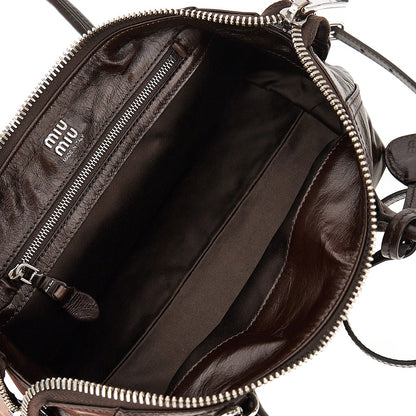 MIU MIU Embossed logo leather bag