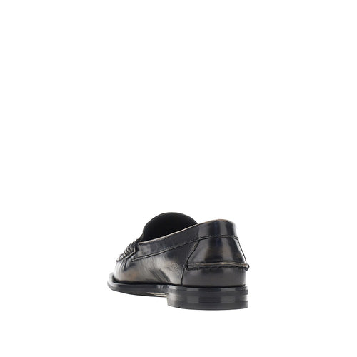 PRADA Antique finish leather loafers