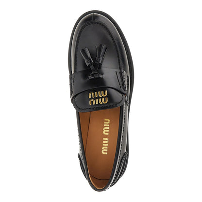 MIU MIU Spazzolato leather loafers with tassels