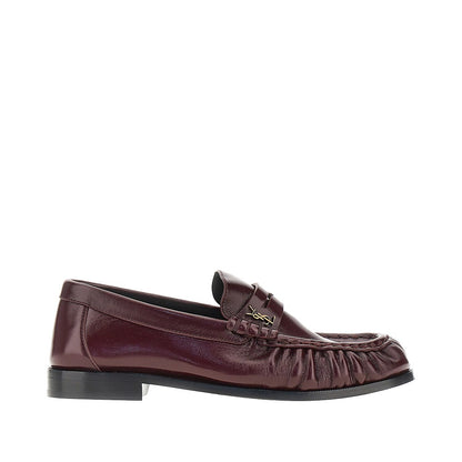 SAINT LAURENT Leather loafers with Cassandre logo