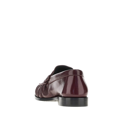 SAINT LAURENT Leather loafers with Cassandre logo