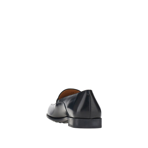 TODS Leather loafers with logo medal