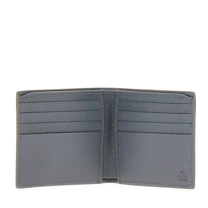 GUCCI Bi-fold wallet with lacquered GG detail