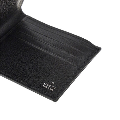 GUCCI Bi-fold wallet with lacquered GG detail