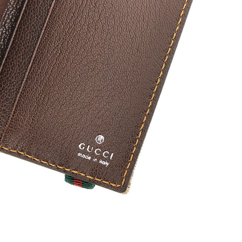 Gucci Coated GG canvas bi-fold cardholder