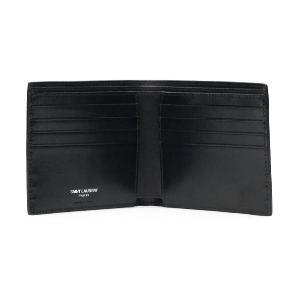 SAINT LAURENT Leather bi-fold wallet with monogram