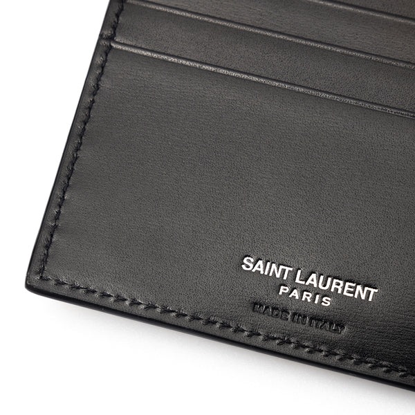 SAINT LAURENT Leather bi-fold wallet with monogram