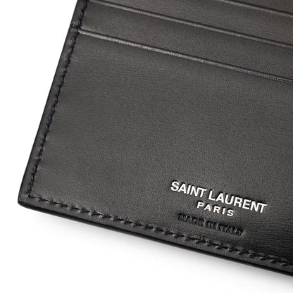 SAINT LAURENT Leather bi-fold wallet with monogram