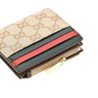 Gucci Coated GG fabric bi-fold wallet